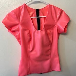 Get ready to turn heads with this stunning bubble gum latex top!